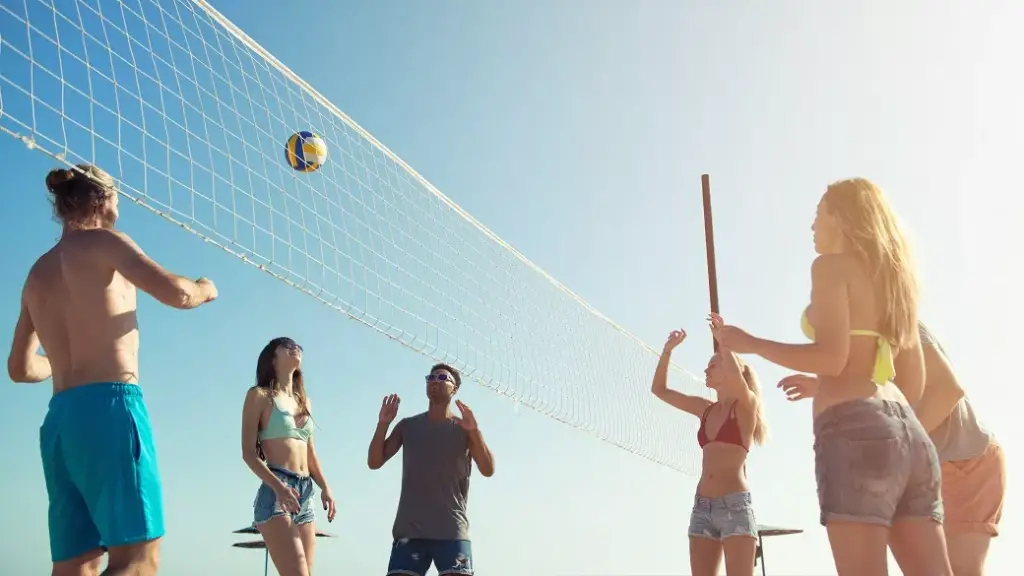 couples playing volleyball